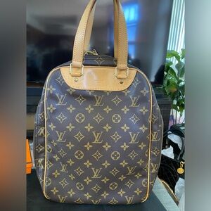 Louis Vuitton Monogram 
Excursion Bag